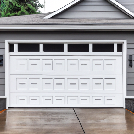 Insulated garage door closed on a suburban Burien home with wet pavement and evergreen landscaping.